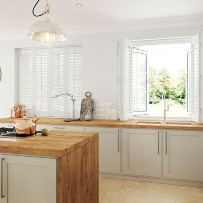 White wooden shutters in a country style kitchen