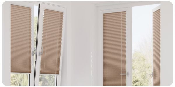 White wooden blinds in a white and wooden dining room